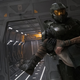 Master Chief carrying a woman aboard a spaceship.